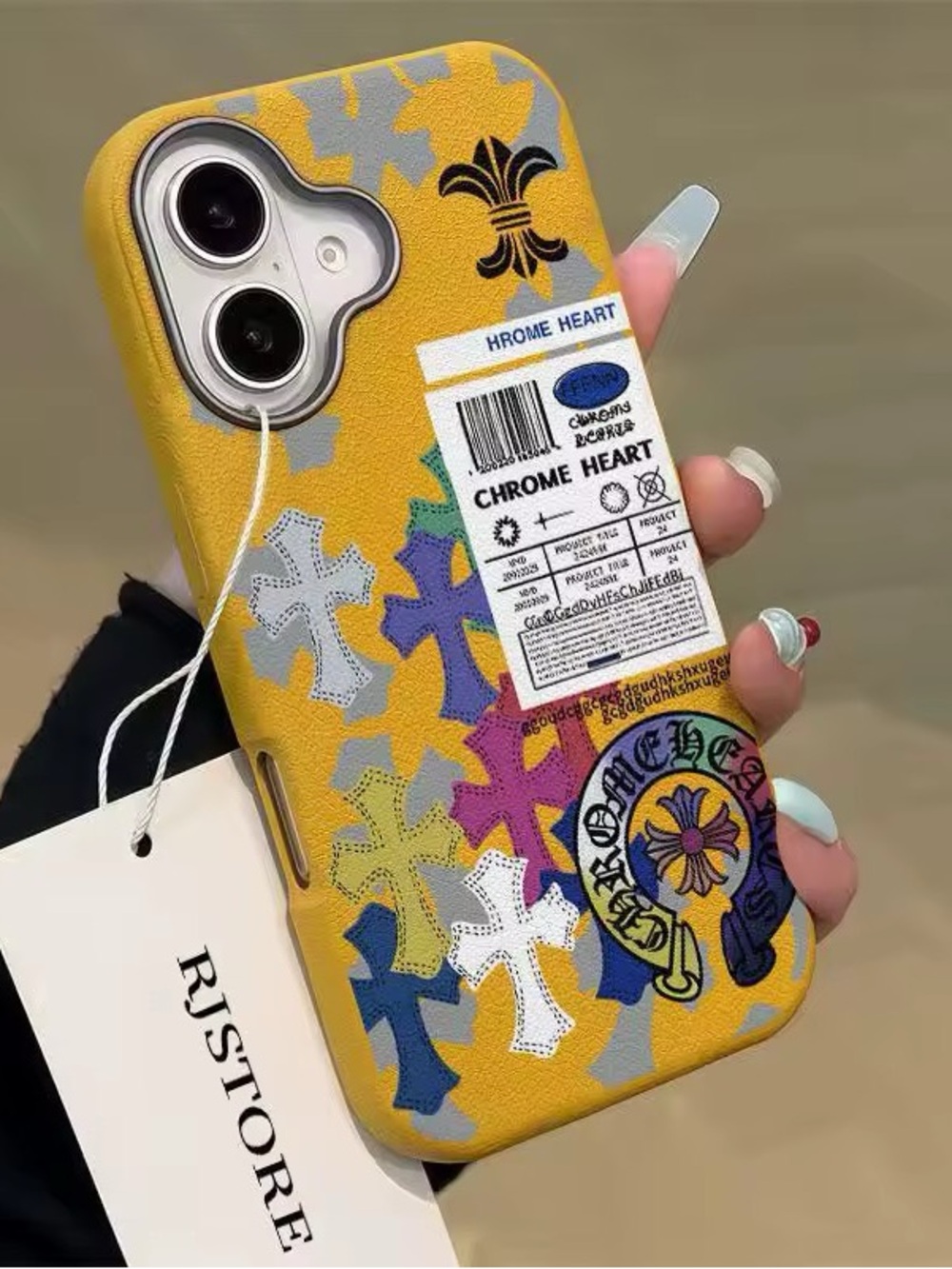 Chrome Hearts Yellow Cross Motif iPhone Case with Multi-Color Accents